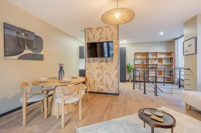Coin salon dans l'établissement Résidence Le Belleville