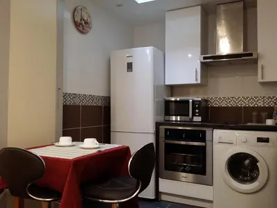 Cuisine ou kitchenette dans l'établissement Hôtel Paris Gambetta