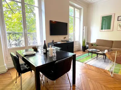 Télévision ou salle de divertissement dans l'établissement L'appartement Michel-Ange