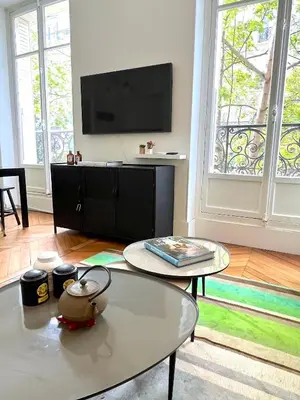 Télévision ou salle de divertissement dans l'établissement L'appartement Michel-Ange