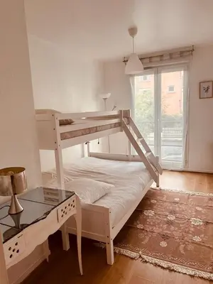 Un ou plusieurs lits dans un hébergement de l'établissement BIG logement , Stade de France à pied, PARIS, métro , parking gratuit
