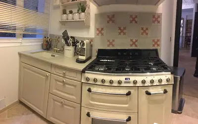 Cuisine ou kitchenette dans l'établissement Appartement 3 chambres Jardin du Luxembourg