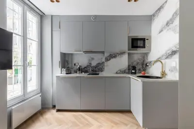 Cuisine ou kitchenette dans l'établissement Neuilly/Paris :Magnifique appartement 4P