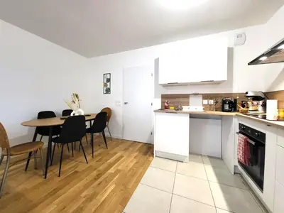 Cuisine ou kitchenette dans l'établissement Le Lucie - Bain de lumière au pied du métro