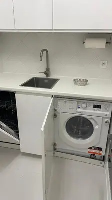 Cuisine ou kitchenette dans l'établissement Un studio de luxe Les Champs Elysées
