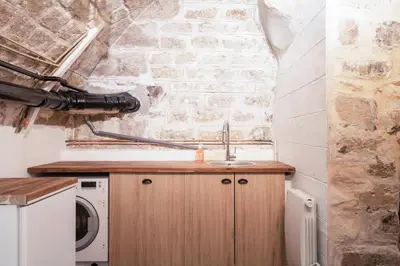 Cuisine ou kitchenette dans l'établissement Apartment lyonnais center of paris