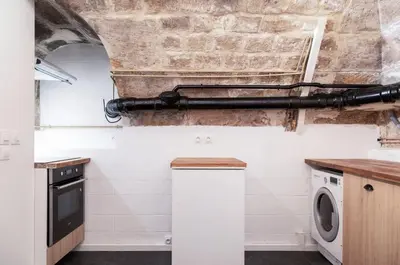 Cuisine ou kitchenette dans l'établissement Apartment lyonnais center of paris