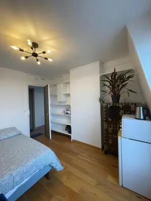 Un ou plusieurs lits dans un hébergement de l'établissement Private room center Paris