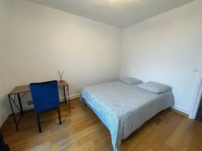 Un ou plusieurs lits dans un hébergement de l'établissement Private room center Paris