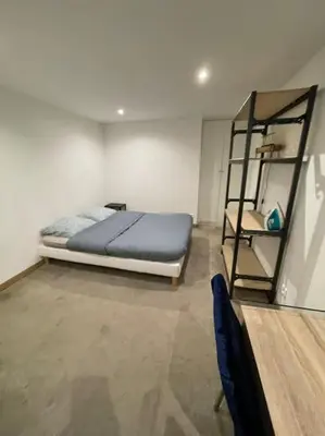 Un ou plusieurs lits dans un hébergement de l'établissement confortable appartement 3 pièces Flatters