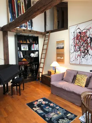 Coin salon dans l'établissement Charming apartment on top floor in Marais -5P