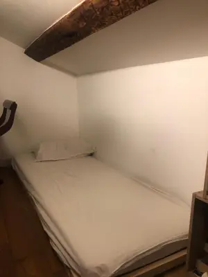 Un ou plusieurs lits dans un hébergement de l'établissement Charming apartment on top floor in Marais -5P