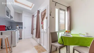 Cuisine ou kitchenette dans l'établissement Nid d'amour