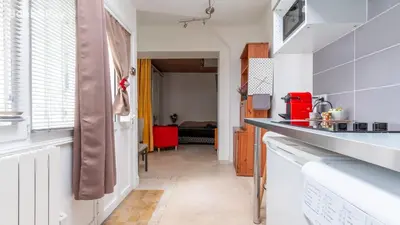 Cuisine ou kitchenette dans l'établissement Nid d'amour