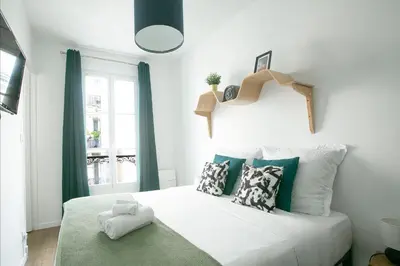 Un ou plusieurs lits dans un hébergement de l'établissement Charming 1 Bedroom Marais Hideaway - FB17A