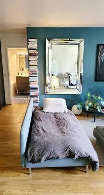 Un ou plusieurs lits dans un hébergement de l'établissement Lovely Artist Appartment