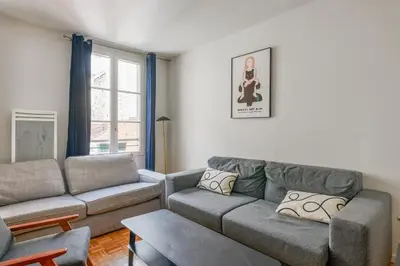Coin salon dans l'établissement Appartement Garnet - Welkeys