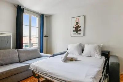 Un ou plusieurs lits dans un hébergement de l'établissement Appartement Garnet - Welkeys