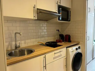 Cuisine ou kitchenette dans l'établissement Clichy studio Getaway - C70