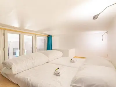 Un ou plusieurs lits dans un hébergement de l'établissement Joli - Lovely studio Paris