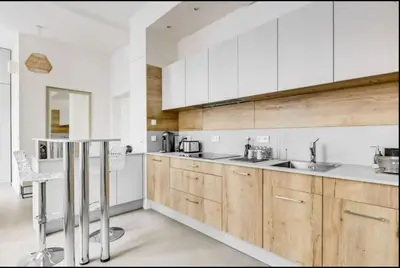 Cuisine ou kitchenette dans l'établissement Superbe Loft 67 m2 Bastille Marais
