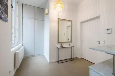 Salle de bains dans l'établissement Superbe Loft 67 m2 Bastille Marais