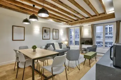 Coin salon dans l'établissement Magnifique appartement pour 6 - Montorgueil