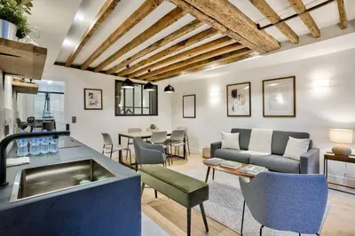 Coin salon dans l'établissement Magnifique appartement pour 6 - Montorgueil
