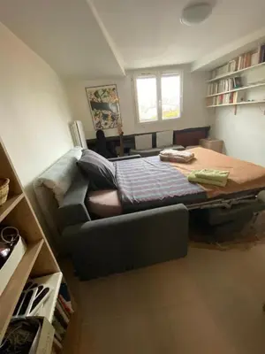 Coin salon dans l'établissement Petit appartement Gare de Lyon