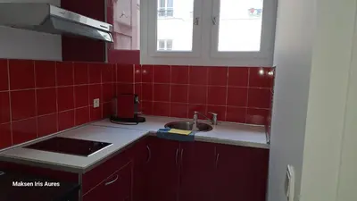 Cuisine ou kitchenette dans l'établissement Appartement 9ème