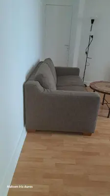 Coin salon dans l'établissement Appartement 9ème