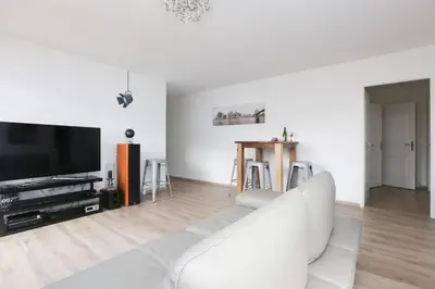 Télévision ou salle de divertissement dans l'établissement Paris-Stade De France 3 rooms Parking Metro