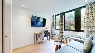 Télévision ou salle de divertissement dans l'établissement 312 Suite Lisa - Superbe Appartement à Paris