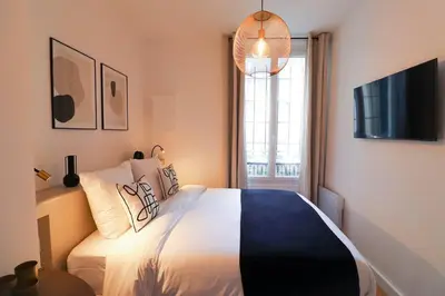Un ou plusieurs lits dans un hébergement de l'établissement AmazingApartment # Le Marais# Rue Des Archives# AC