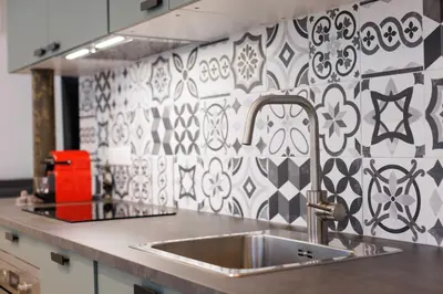Cuisine ou kitchenette dans l'établissement Exceptionnel duplex à proximité de Montmartre!