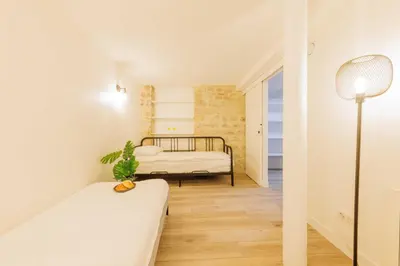 Un ou plusieurs lits dans un hébergement de l'établissement Exceptionnel duplex à proximité de Montmartre!