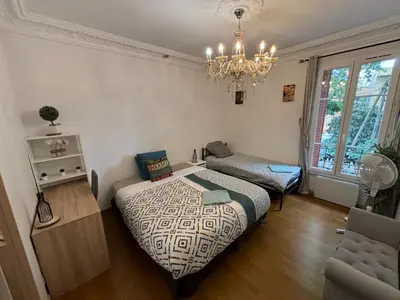 Un ou plusieurs lits dans un hébergement de l'établissement B1 Appart 2022 - 10min PARIS/EXPO - 5 rooms/6 beds