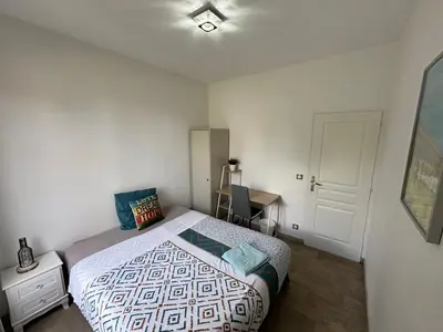 Un ou plusieurs lits dans un hébergement de l'établissement B1 Appart 2022 - 10min PARIS/EXPO - 5 rooms/6 beds