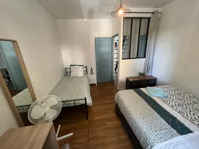 Un ou plusieurs lits dans un hébergement de l'établissement B1 Appart 2022 - 10min PARIS/EXPO - 5 rooms/6 beds