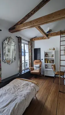 Un ou plusieurs lits dans un hébergement de l'établissement Chambre privée centre de Paris proche Marais