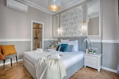 Un ou plusieurs lits dans un hébergement de l'établissement Charmant 160m² 6CH-Haussmannien Climatisé & Ascens