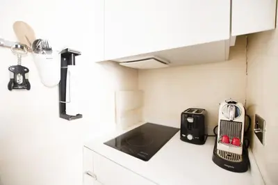 Cuisine ou kitchenette dans l'établissement GuestReady - Charmant studio à 10 mins du Louvre