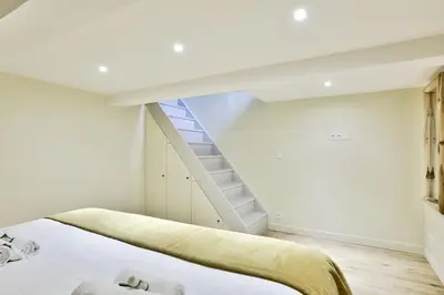Un ou plusieurs lits dans un hébergement de l'établissement Cosy appartement - Eiffel Tower