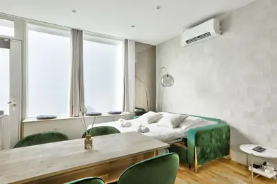 Coin salon dans l'établissement Cosy appartement - Eiffel Tower
