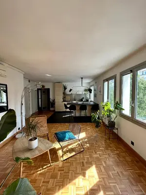 Coin salon dans l'établissement Superbe appartement au porte de Paris et du salon des expositions