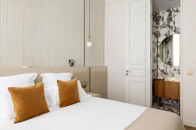 Un ou plusieurs lits dans un hébergement de l'établissement HIGHSTAY - Luxury Serviced Apartments - Le Marais