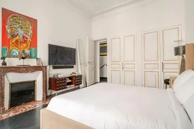 Télévision ou salle de divertissement dans l'établissement Le Loft du Triangle D'or