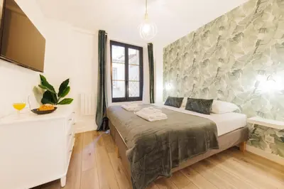 Un ou plusieurs lits dans un hébergement de l'établissement Exceptionnel appartement à proximité de Montmartre!