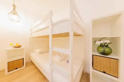 Un ou plusieurs lits dans un hébergement de l'établissement Exceptionnel appartement à proximité de Montmartre!