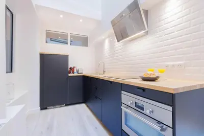 Cuisine ou kitchenette dans l'établissement Exceptionnel appartement à proximité de Montmartre!